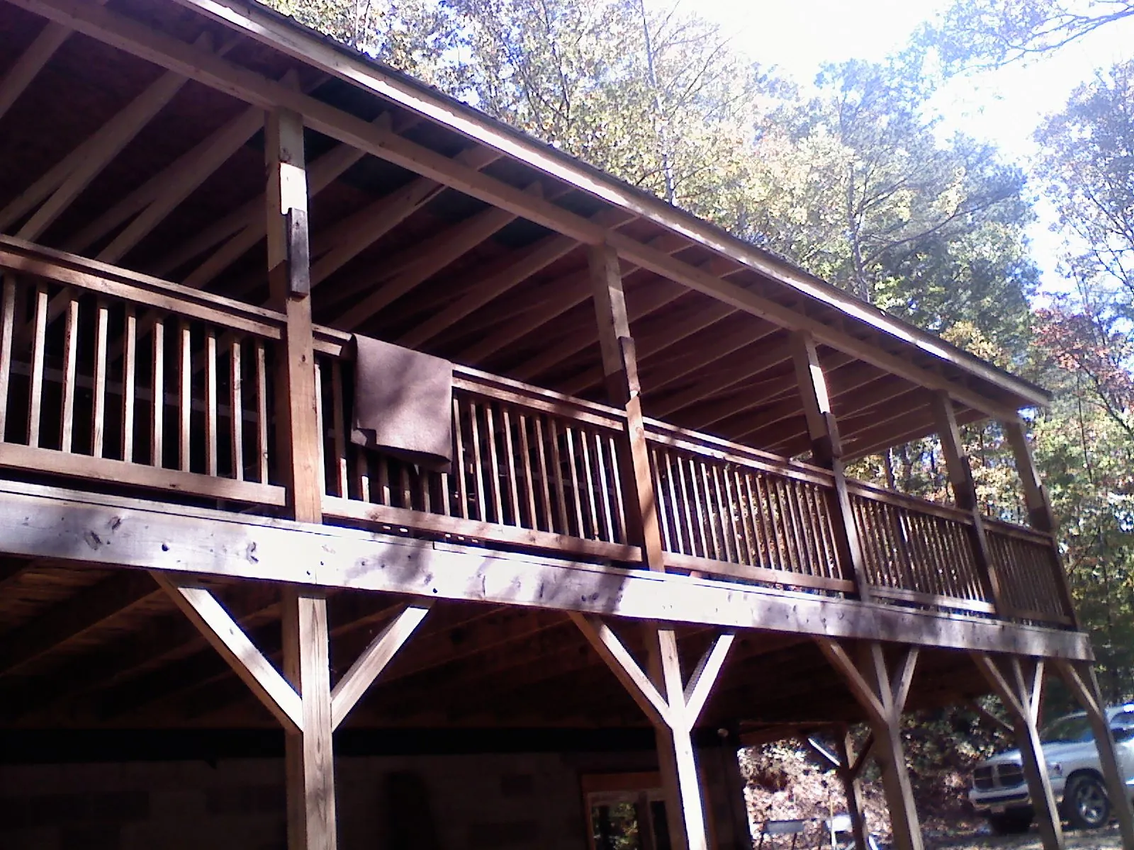 Timber framing under a new elevated porch and deck — Roof Leak Repair in Michigan City by Roofing Brothers
